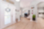 Wide-angle interior photography of a front entryway and office in Clermont Florida