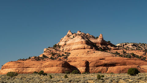Photo of a rock formation that appears to have sprouted horns near Moab, Utah