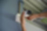 cctv camera contractor installing cameras on wall