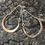 Thumbnail: Bronze and sterling silver hoop earrings