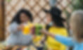 multiracial-friends-toasting-with-fruits-fresh-smo-2024-12-05-08-38-57-utc.jpg