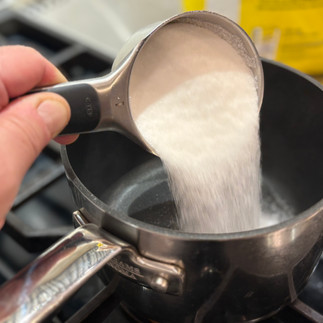 Add 2 cups sugar to 1 cup water