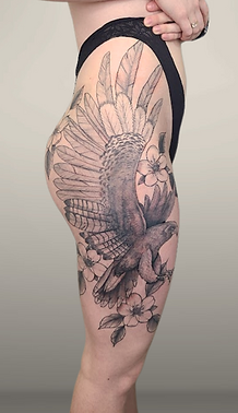 Hawk Hip to thigh tattoo
