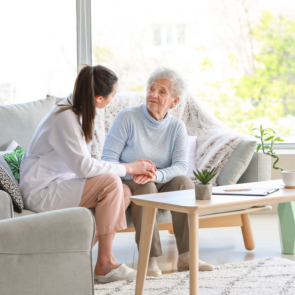 Caregiver with patient at their home