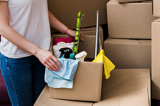 crop-woman-packing-boxes.jpg