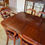 Thumbnail: Fabulous mahogany extendable Victorian dining table with 10 leather chairs