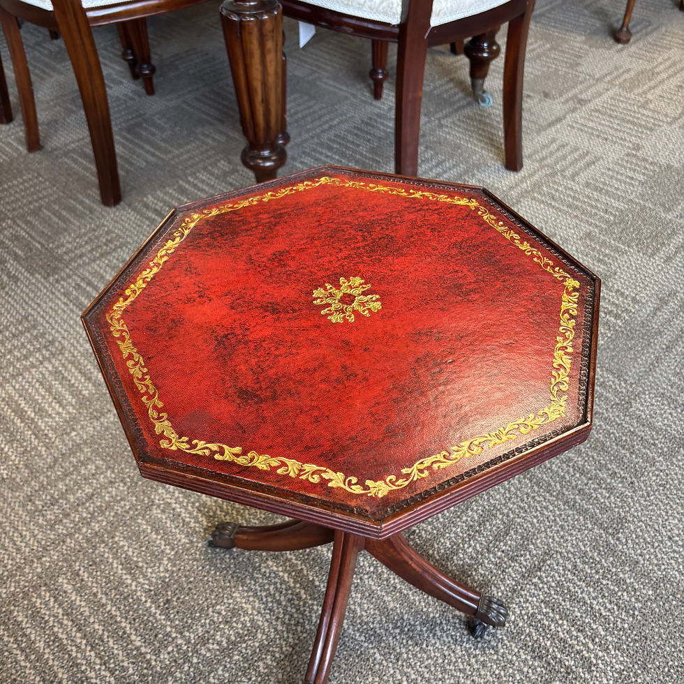 Thumbnail: Vintage Regency-style octagonal wine table featuring a gilt-embossed oxblood top