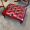 Thumbnail: Fabulous deep red leather buttoned footstool