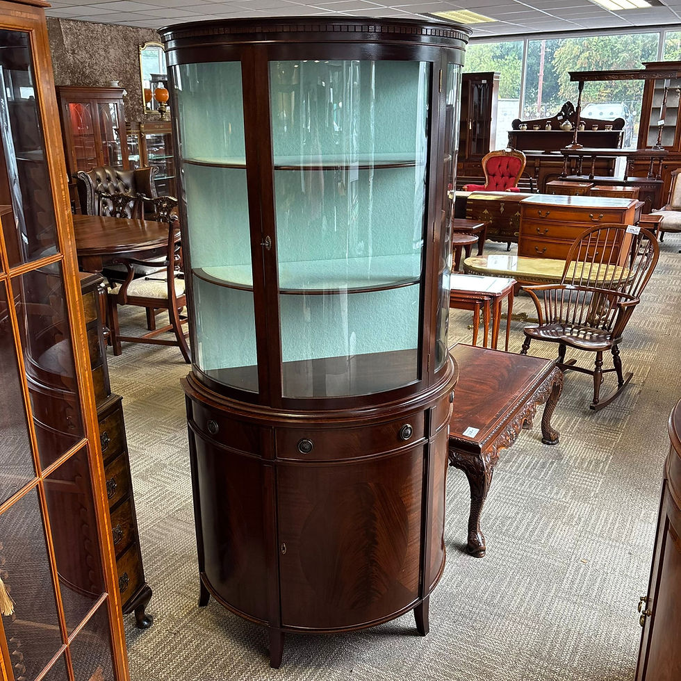 Thumbnail: Mahogany bow-front display cabinet with curved glazed top front