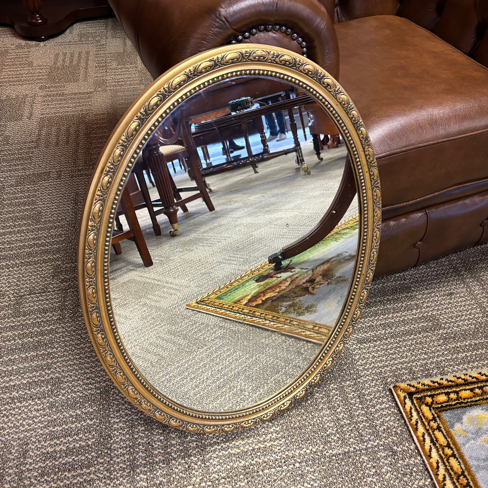 Beautiful ornate oval gilt wall mirror