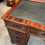 Thumbnail: Mahogany flamed green leather top twin pedestal writing desk