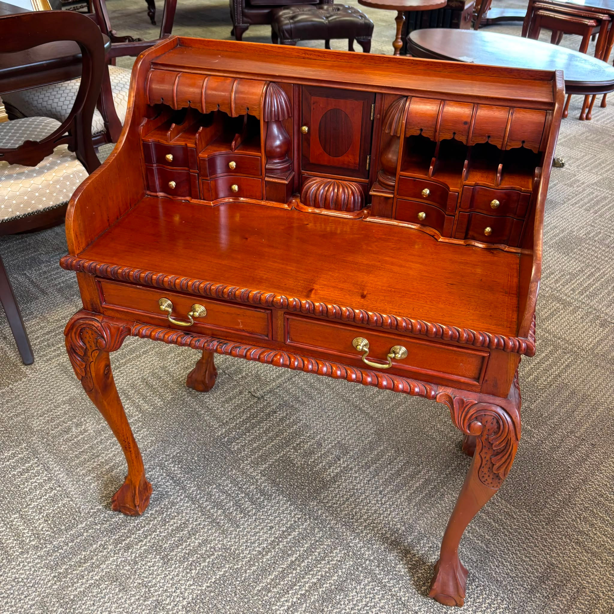 Chippendale style mahogany bureau with ten upper drawers