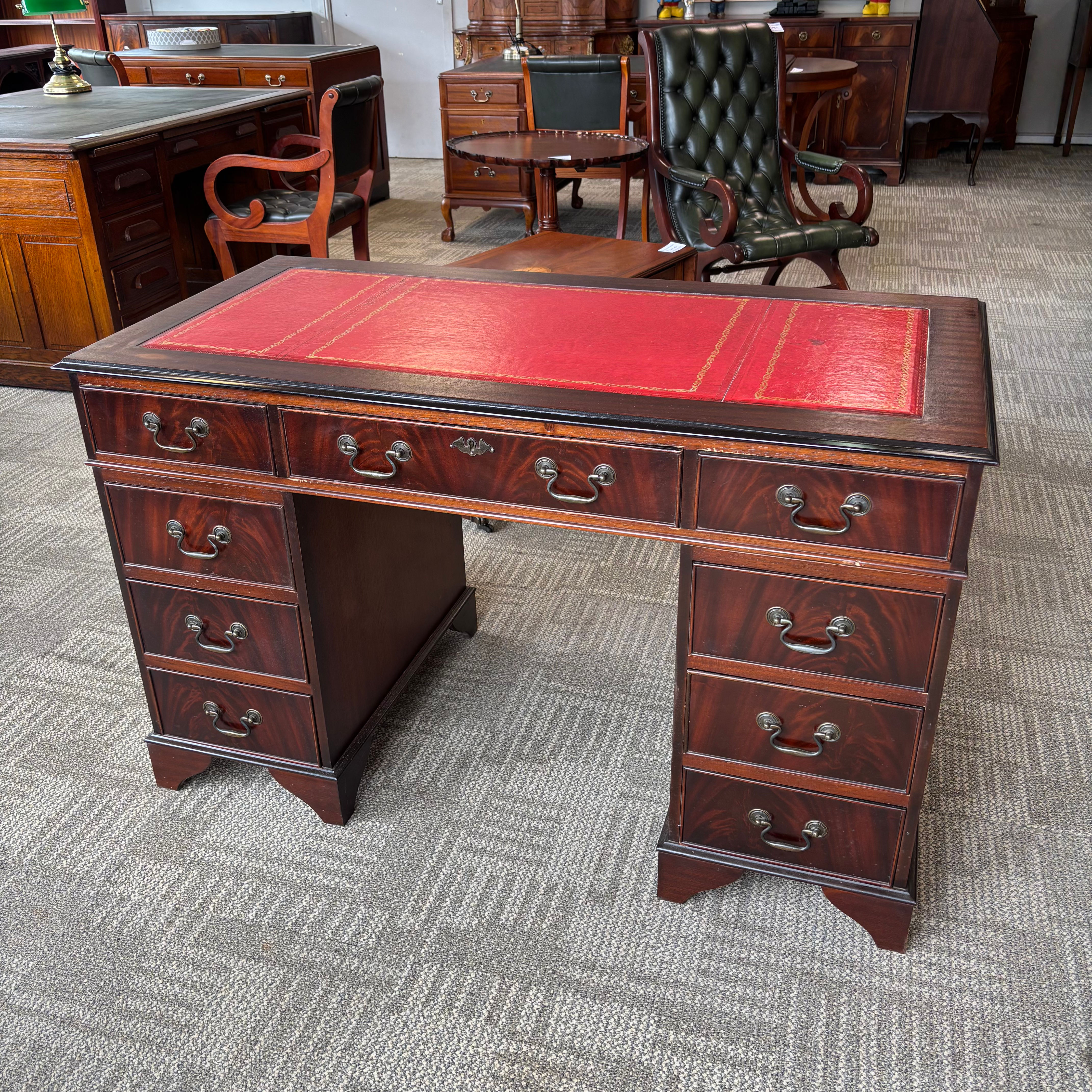 Mahogany red leather top twin pedestal writing desk