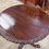 Thumbnail: 19th century mahogany circular occasional table on decorative carved tri