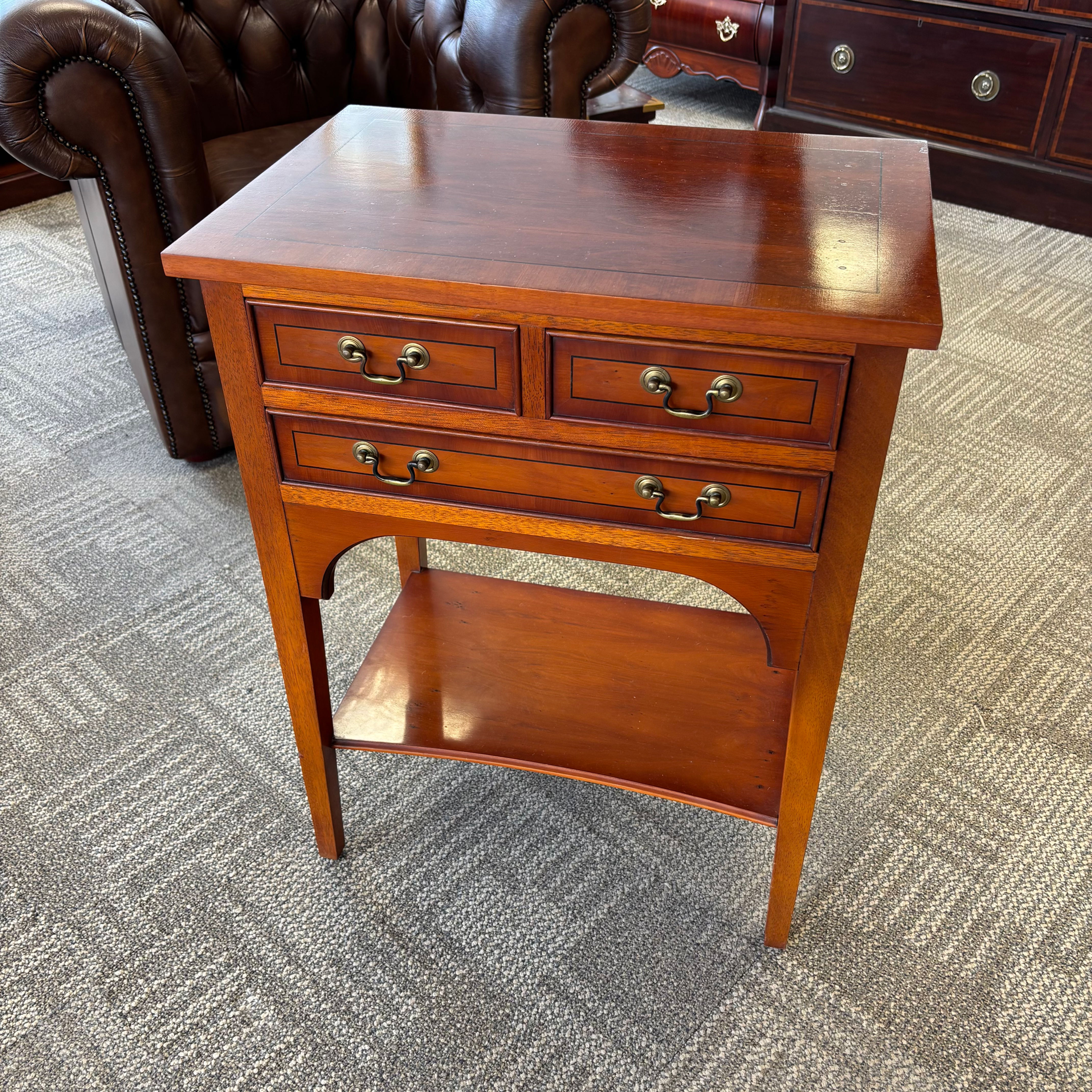 Beautifully crafted mahogany lamp table featuring three drawers
