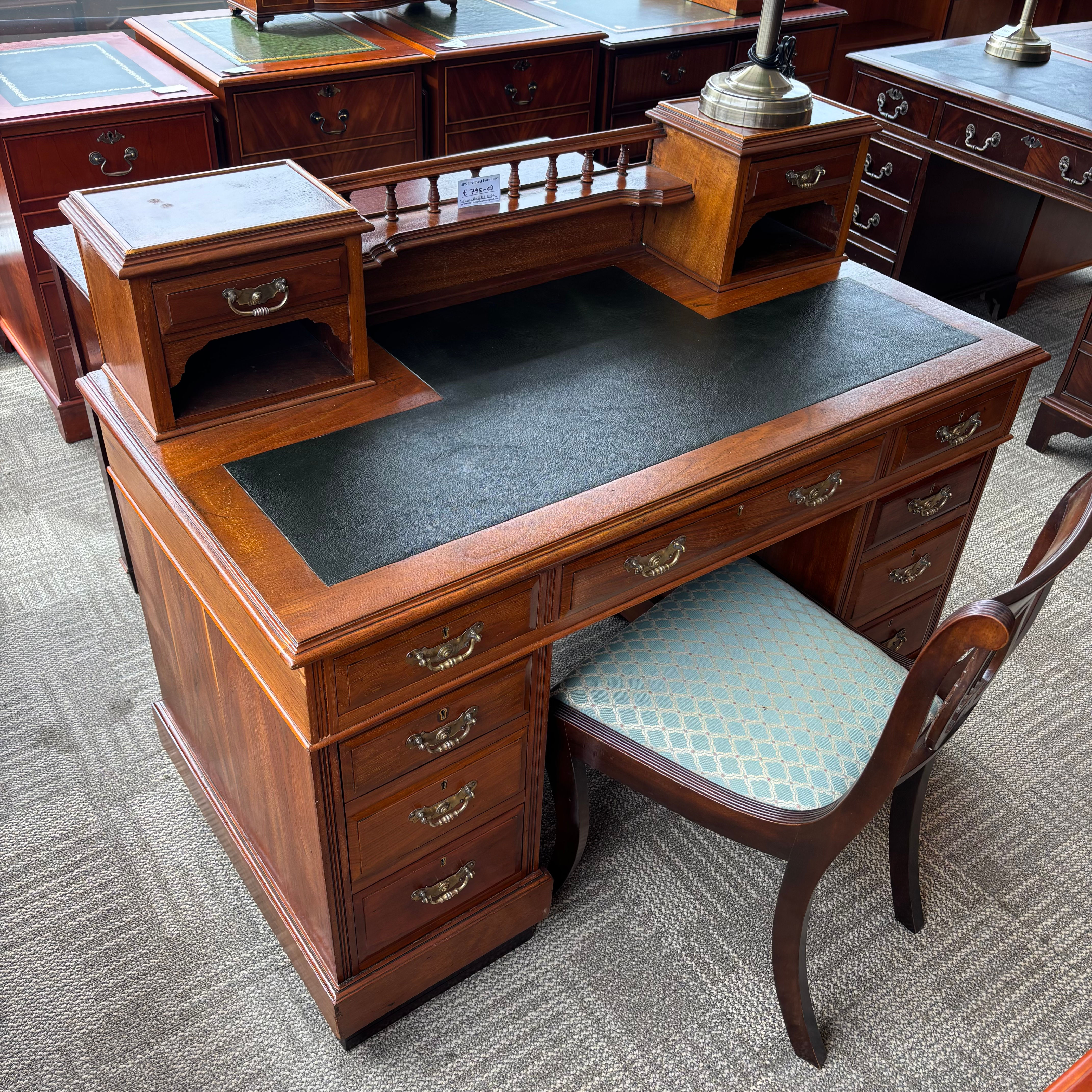 Beautiful antique Dickinson pedestal writing desk with green leather top