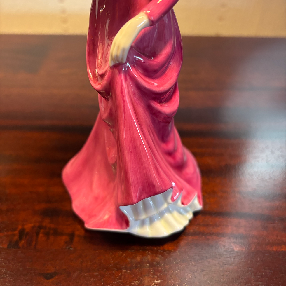 Thumbnail: Royal Doulton figurine, specifically the "Lady Doulton" figurine