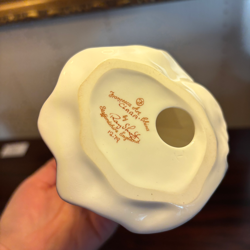 Thumbnail: Royal Doulton figurine, specifically the "Lady Doulton" figurine