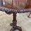 Thumbnail: 19th century mahogany circular occasional table on decorative carved tri