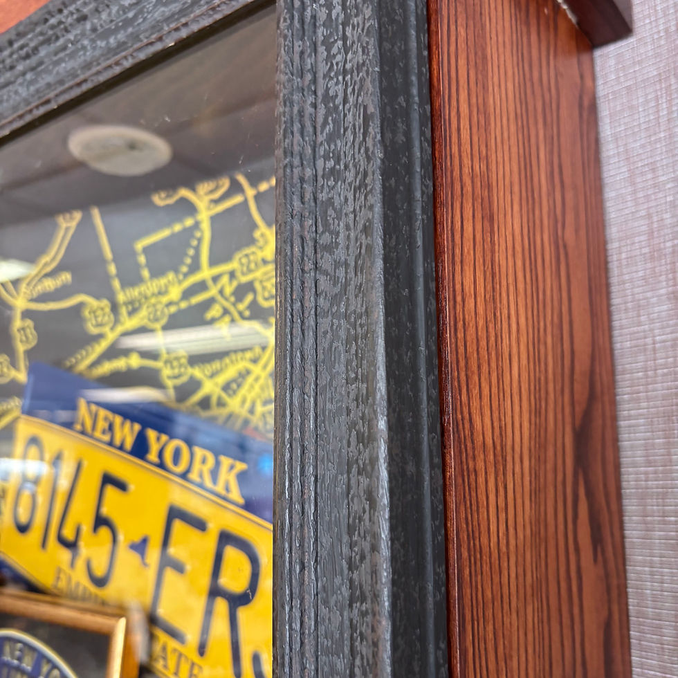 Thumbnail: A cased diorama of items relating to New York taxis