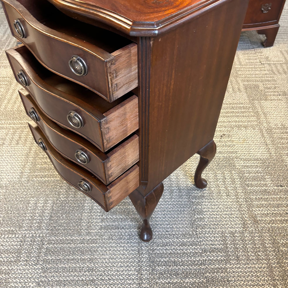 Thumbnail: Mahogany chest of four drawers raised on cabriolet legs