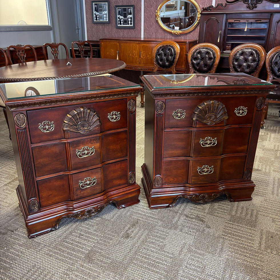 Thumbnail: A beautiful matching pair of traditional mahogany bedside chests with glass tops