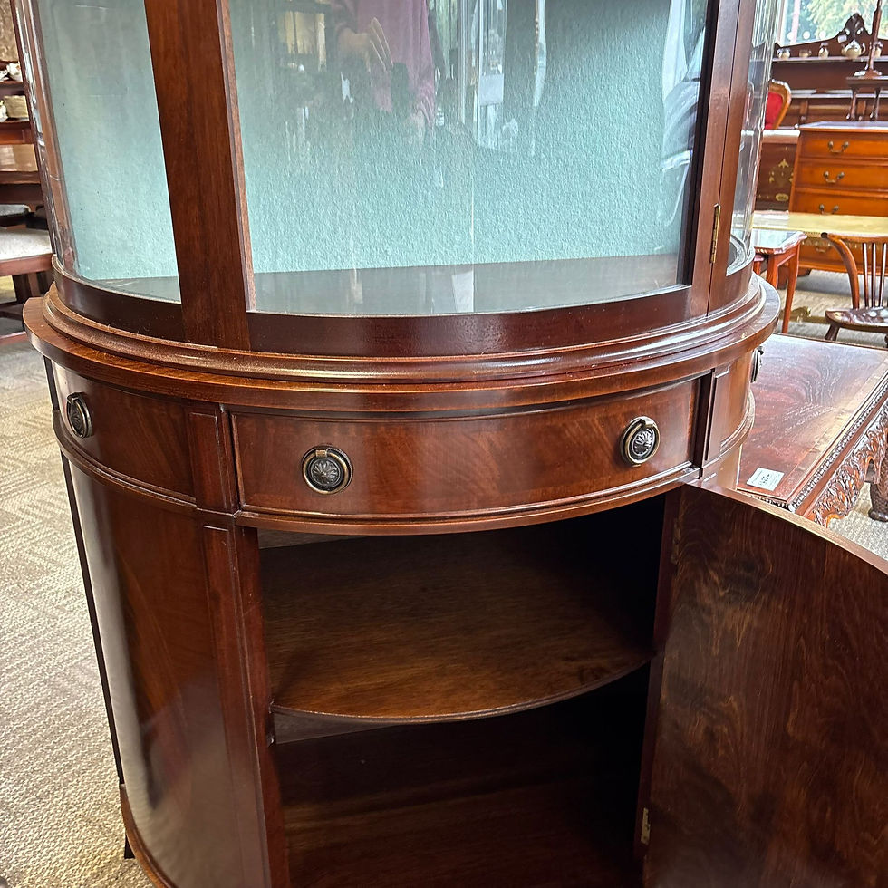 Thumbnail: Mahogany bow-front display cabinet with curved glazed top front