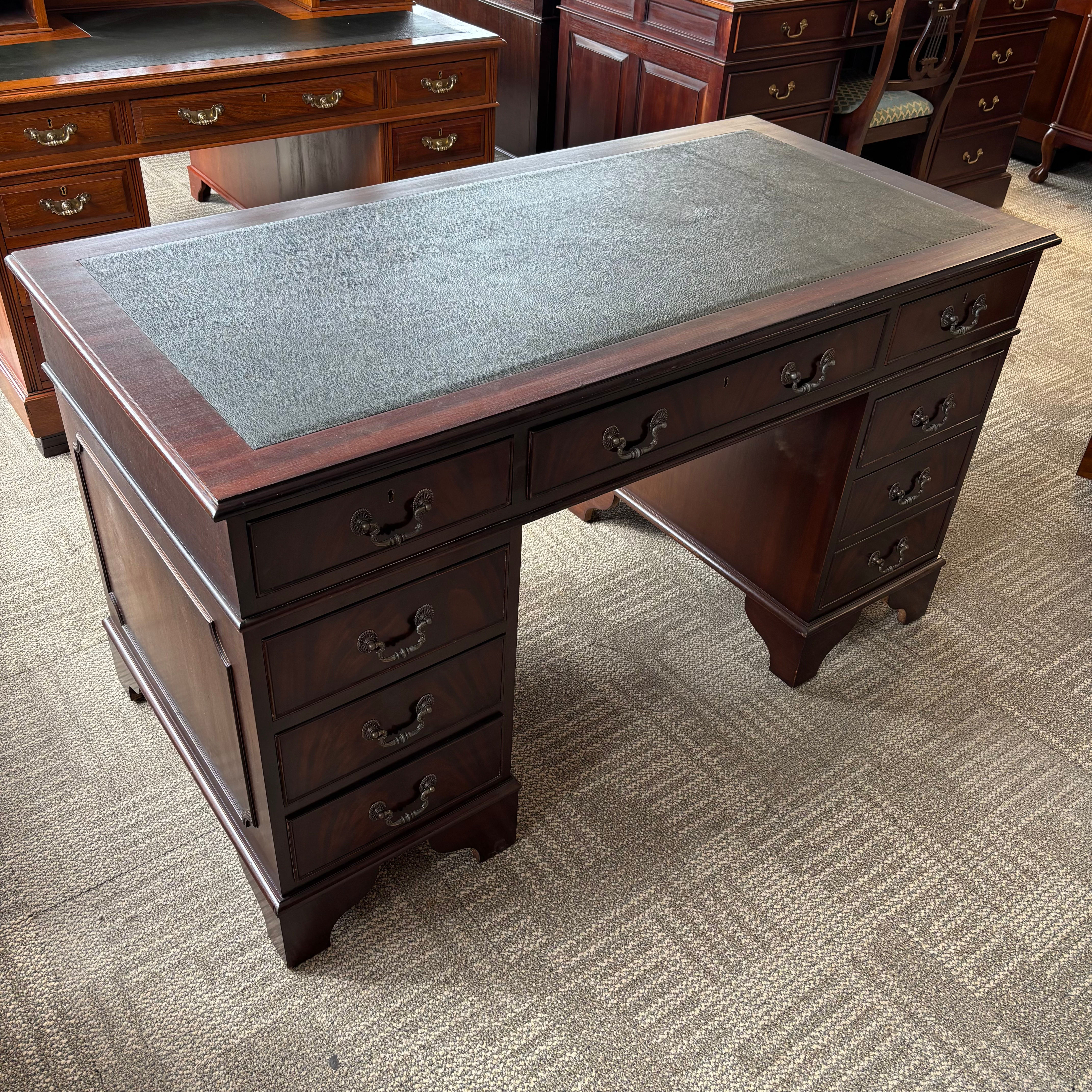 Mahogany green leather top twin pedestal writing desk