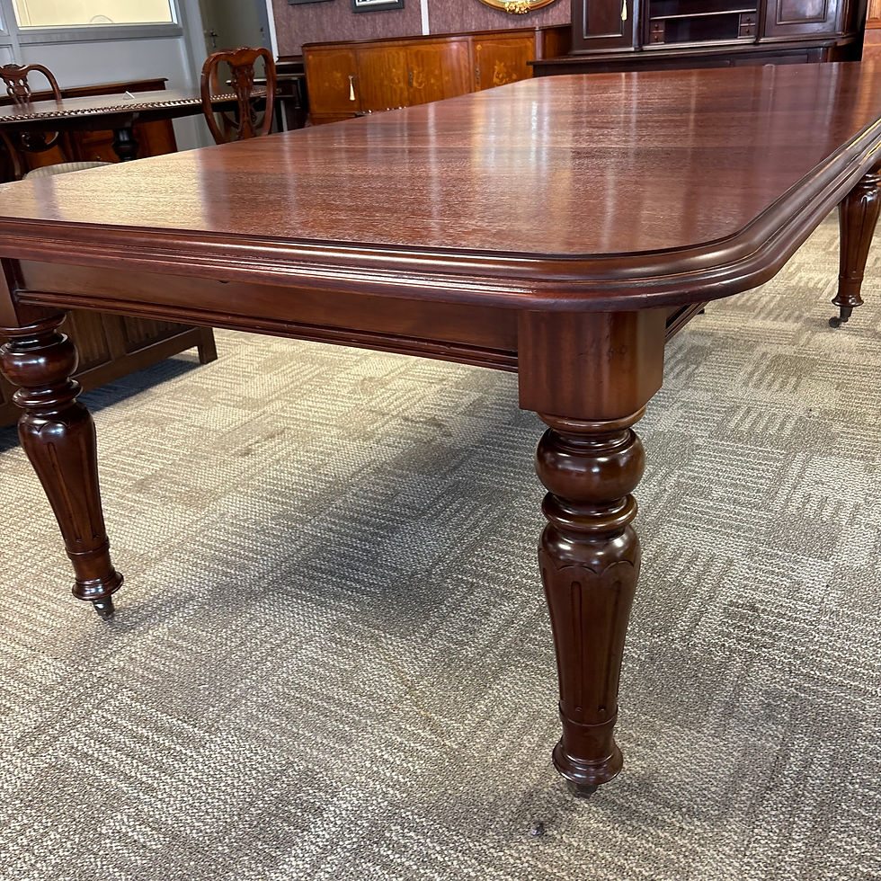 Thumbnail: Victorian-style mahogany extendable dining table with turned legs