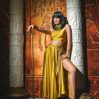 Custom Egyptian photography set in LA studio featuring throne, columns, and props