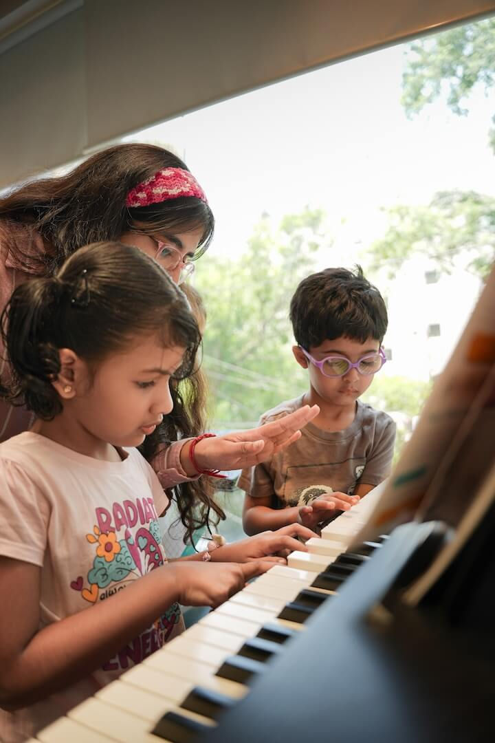 Eye-level view of a music classroom with students playing instruments
