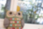 Stuffed toy owl on a windowsill