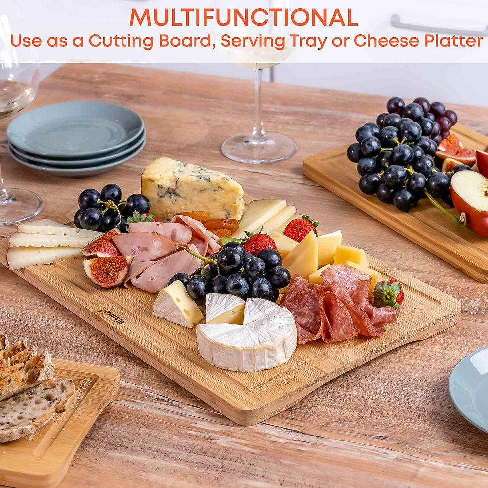 Thumbnail: Multifunctional bamboo board with cheese, meat, and grapes.