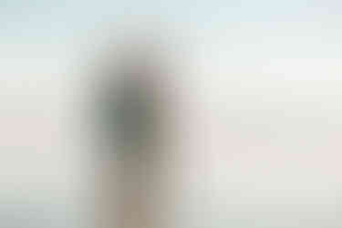 Family portrait photoshoot at the beach