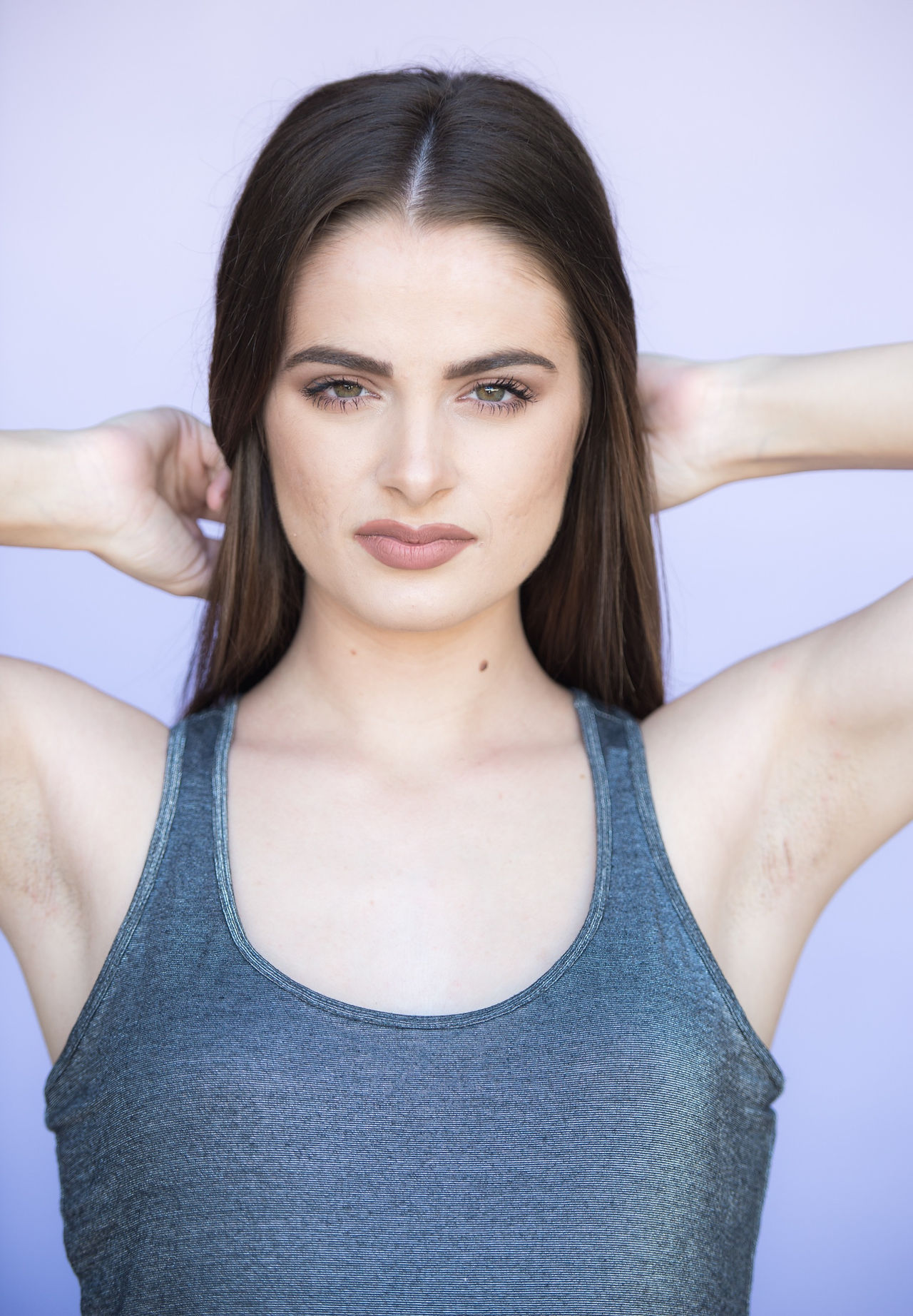 female model poses for her modeling headshot photoshoot