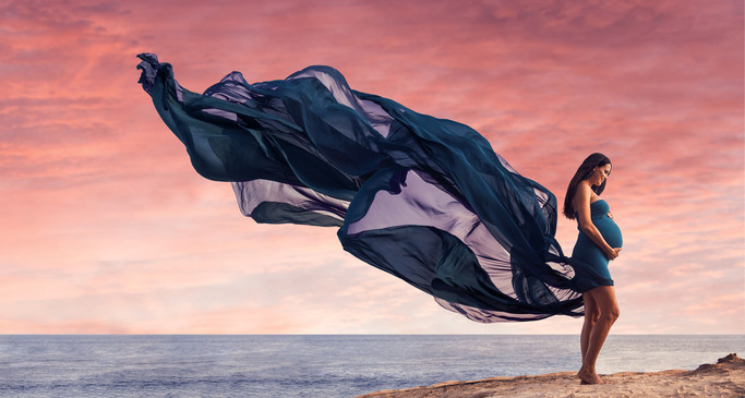 Maternity photoshoot with a flowing dress