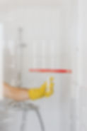 crop-person-cleaning-glass-shower-unit-4