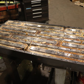 An opened Walker chuck under evaluation for repair.