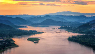 Sunset behind hill and Mekong river view at Nong Khai