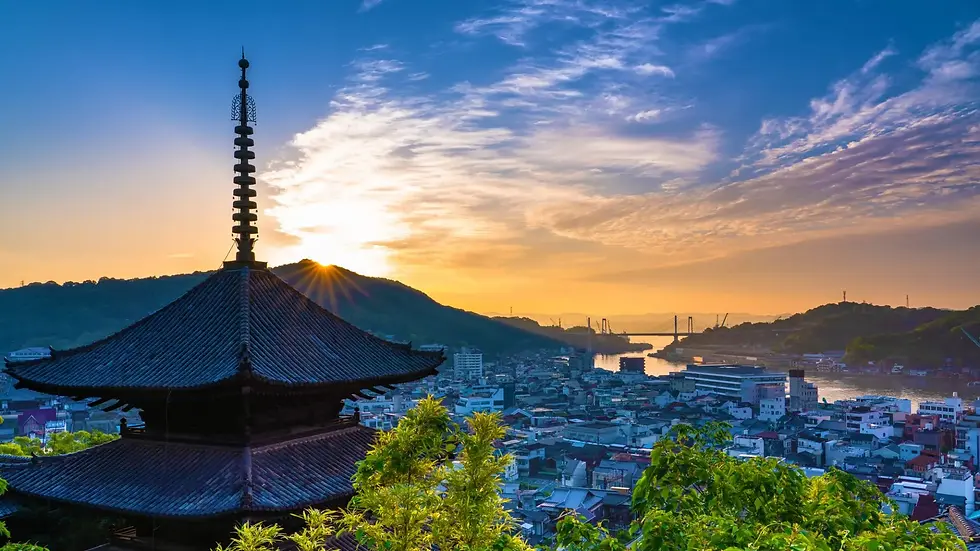 A Pagoda with the city of  Onomichi, Japan in the background during sunrise