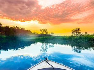 Boat at sunset on the Amazon River