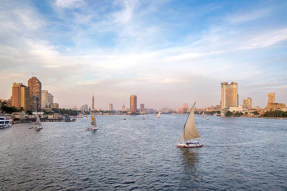 View of the sailboats on the Nile river and Cairo buildings from the university bridge,