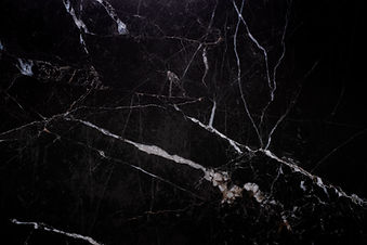 vecteezy_natural-black-marble-texture-for-skin-tile-wallpaper_2223687.jpg