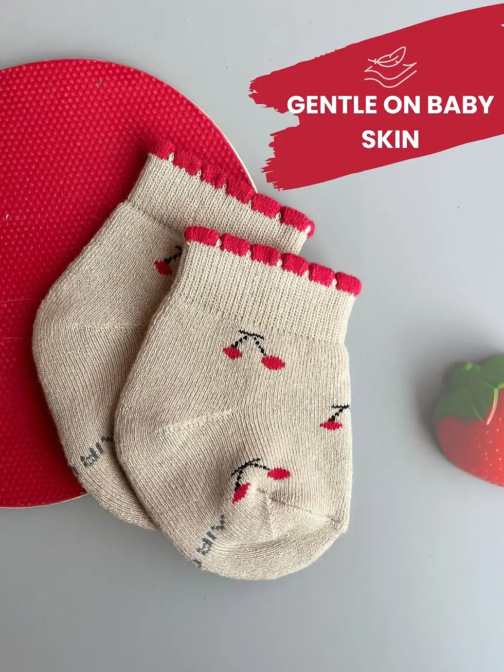 Thumbnail: Baby wearing socks with cheerful patterns and colors.