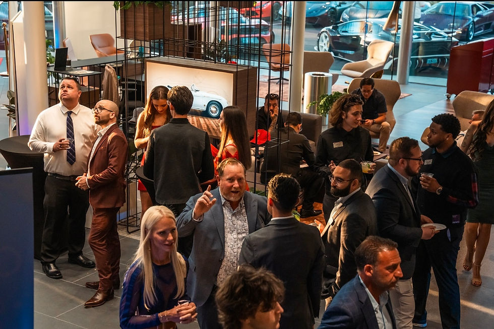 Eye-level view of luxury yachts docked at a Tampa marina with high-rise condos in the background