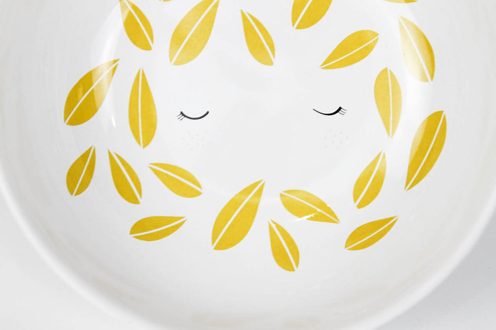 Thumbnail: Girl with leaves - yolky yellow bowl