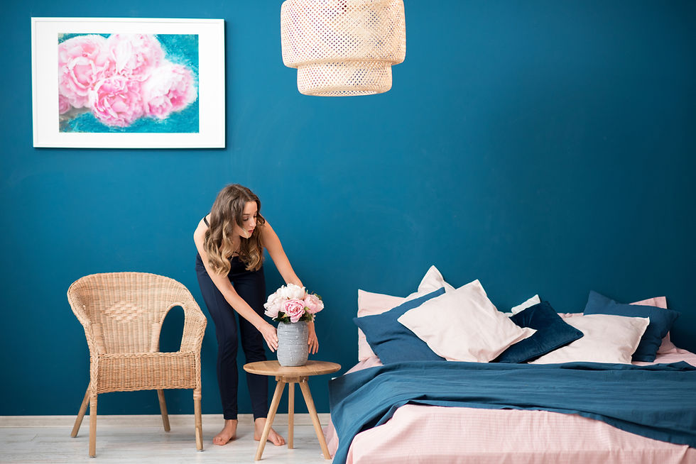 woman cleaning her room
