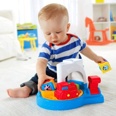 Миниатюра: Поезд CDC13 Волшебные кубики Fisher-Price