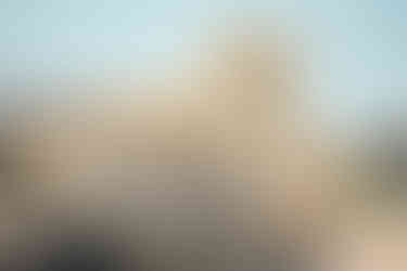 A yellow derelict building in Argostoli port