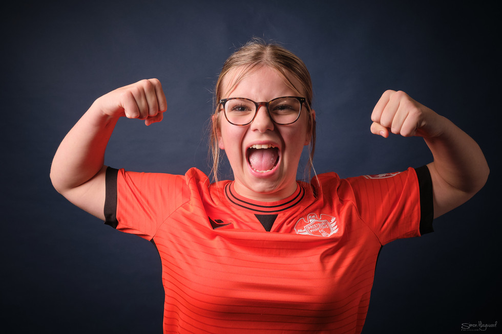 Young girl in prestbury phantoms football kit